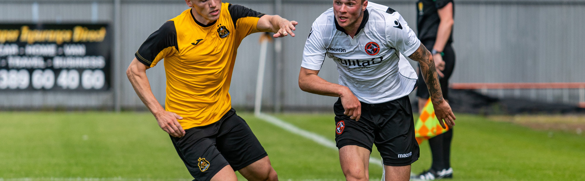 jamie robson fights for the ball