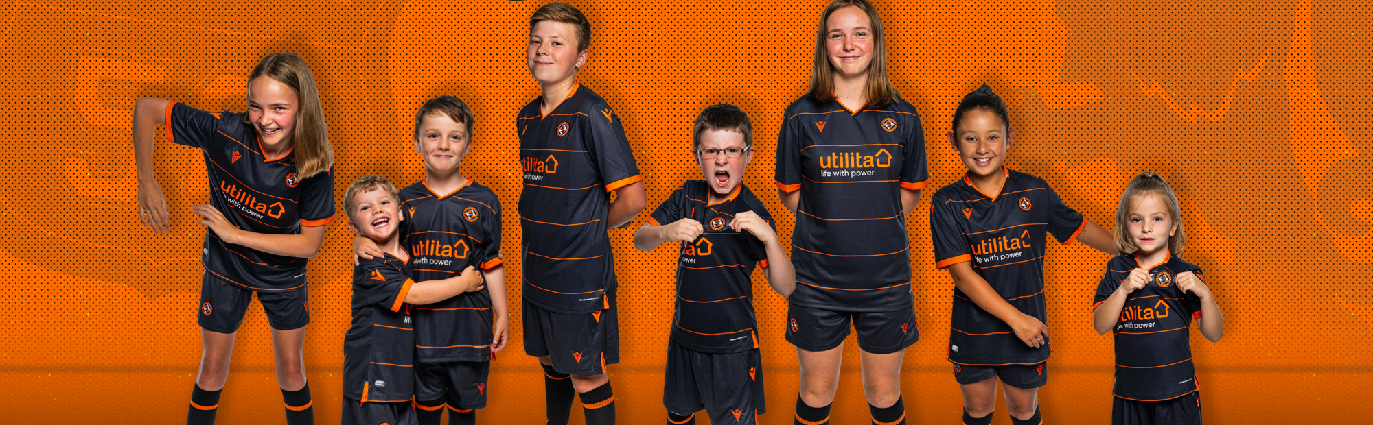 Graphic shows kids in the new alternate kit