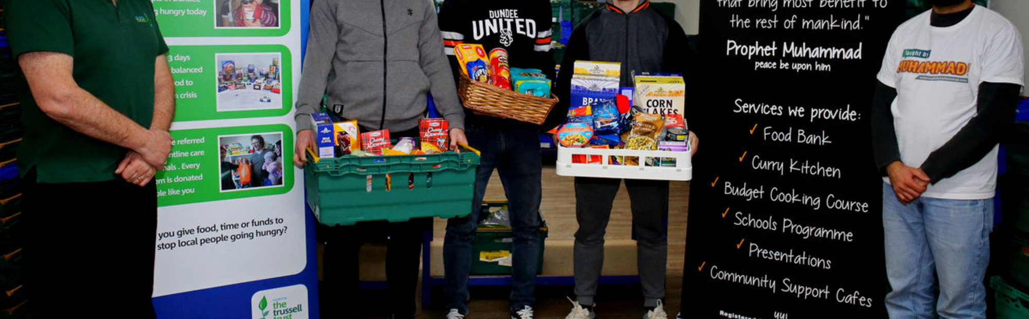 Dundee Foodbank Manager Ken Linton, together with Calum Butcher, Club Captain Mark Reynolds and Rizwan Rafik from Taught by Muhammad